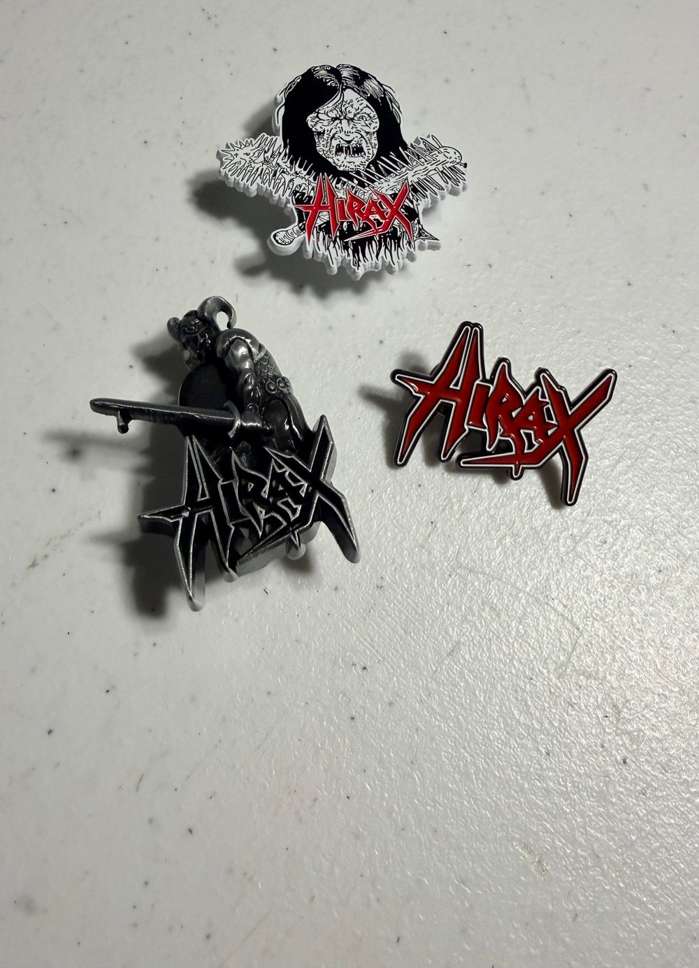 HIRAX metal pin/badge
