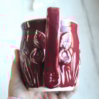 Image 8 of Floral Carved Coffee Cup, 16 Ounce, Ox Blood Red Gardeners Pottery Mug