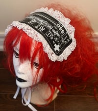 Image 1 of angel autopsy medical headdress (black x white)