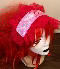 Image 1 of angel autopsy “mutilation is salvation” headdress (pink x red)