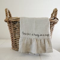 Image 2 of ruffled linen towel - tea (n.) a hug in a cup