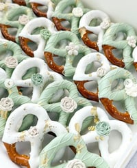 Image 2 of Sage green, white, and gold treat package