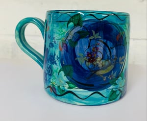 Image of Teal and blue face cylinder mug