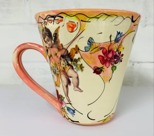 Image of Tall pink figurative mug