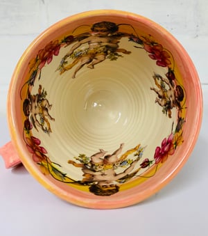 Image of Tall pink figurative mug