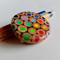 Image 1 of round pencil brooch