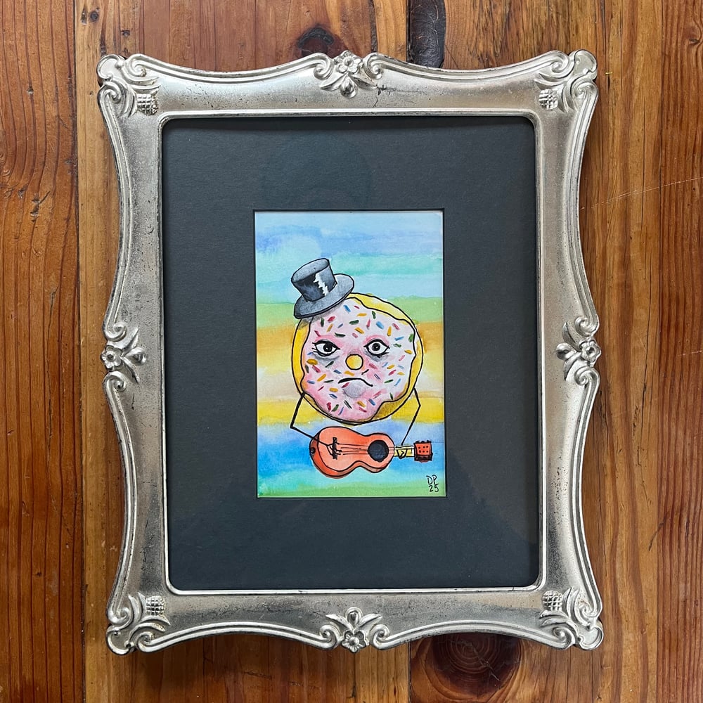 Image of Top Hat Donut Strummer