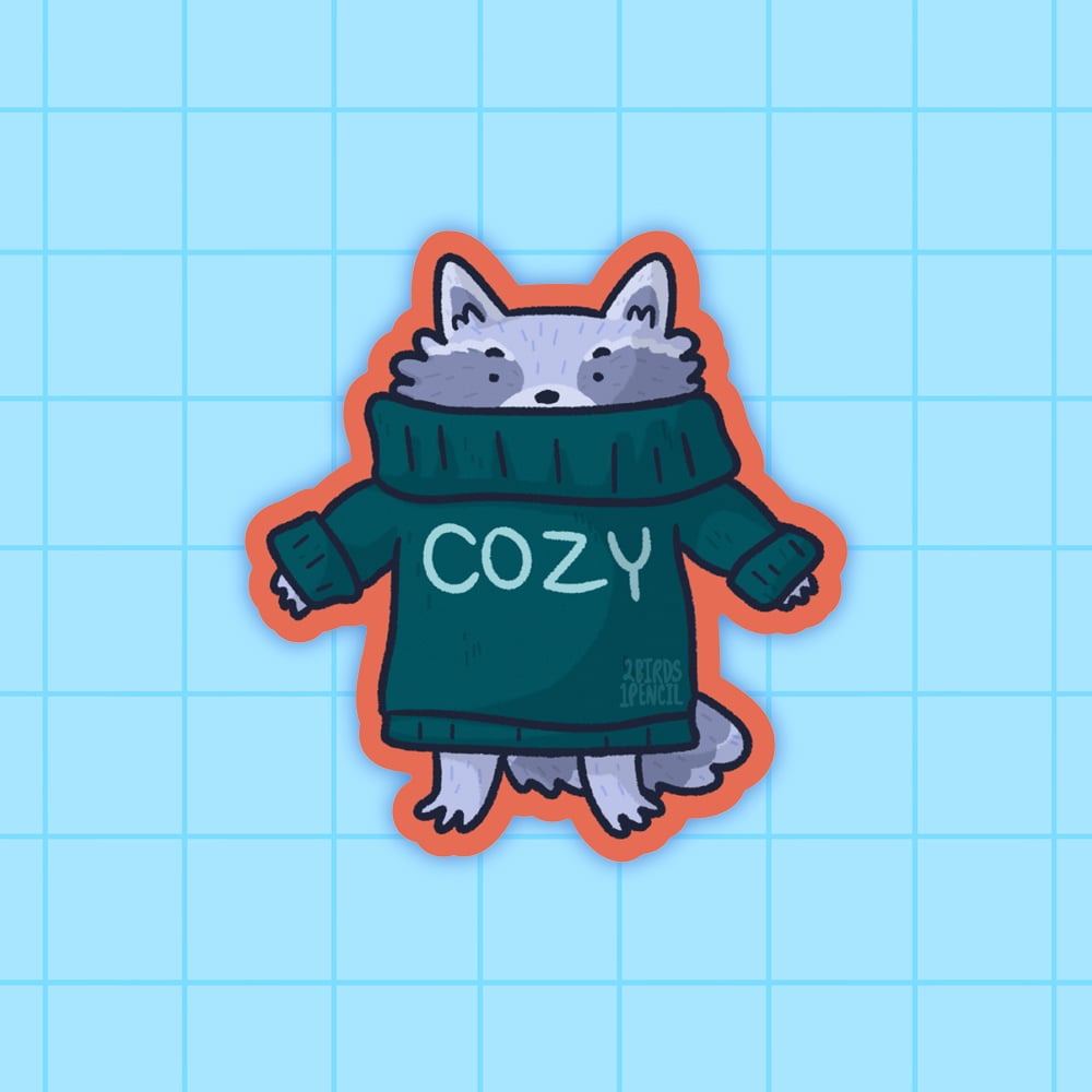 Image of Raccoon in a cozy sweater mini vinyl sticker