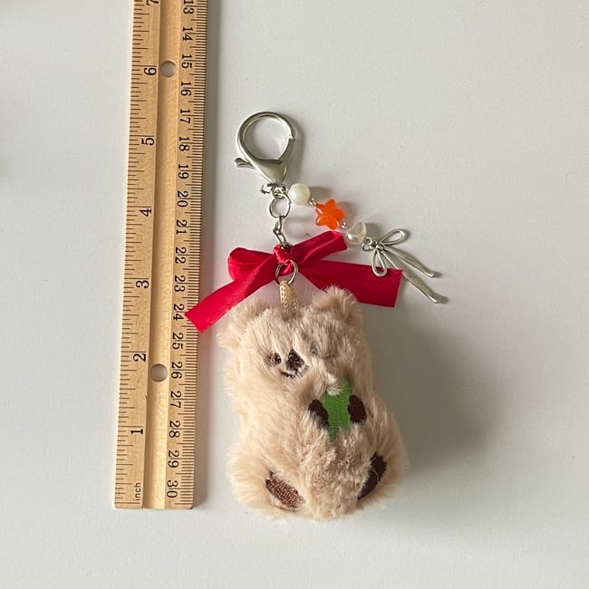 red bowed bear charm
