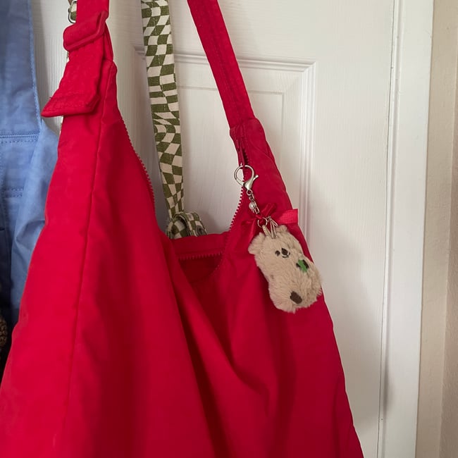 red bowed bear charm