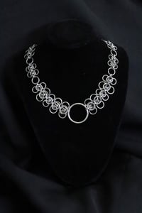 Image 1 of Spine choker