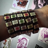 Image 4 of cutie flower charm bracelet