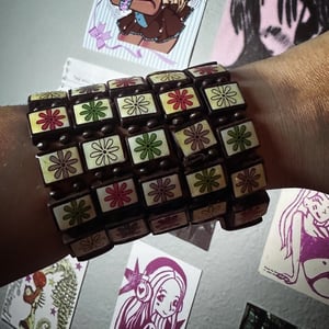 Image of cutie flower charm bracelet