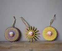 Image 1 of set of three sunburst decorations