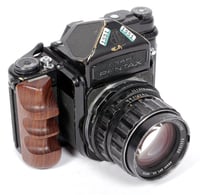 Image 1 of Share Pentax 6X7 camera + metered prism + SMC 105mm F2.4 lens + right hand grip #1551