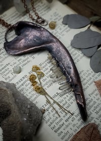 Image 2 of Crystal Teeth Jawbone Amulet