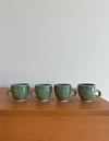 pair of green espresso cups