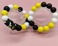 Image 2 of Black and yellow silicone beaded superhero charm bracelet for women teens and girls