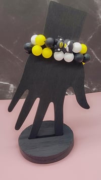Image 3 of Black and yellow silicone beaded superhero charm bracelet for women teens and girls