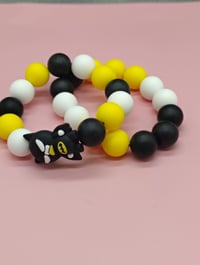 Image 4 of Black and yellow silicone beaded superhero charm bracelet for women teens and girls