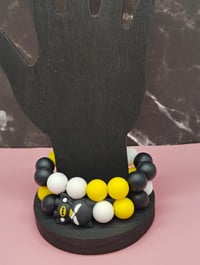 Image 7 of Black and yellow silicone beaded superhero charm bracelet for women teens and girls