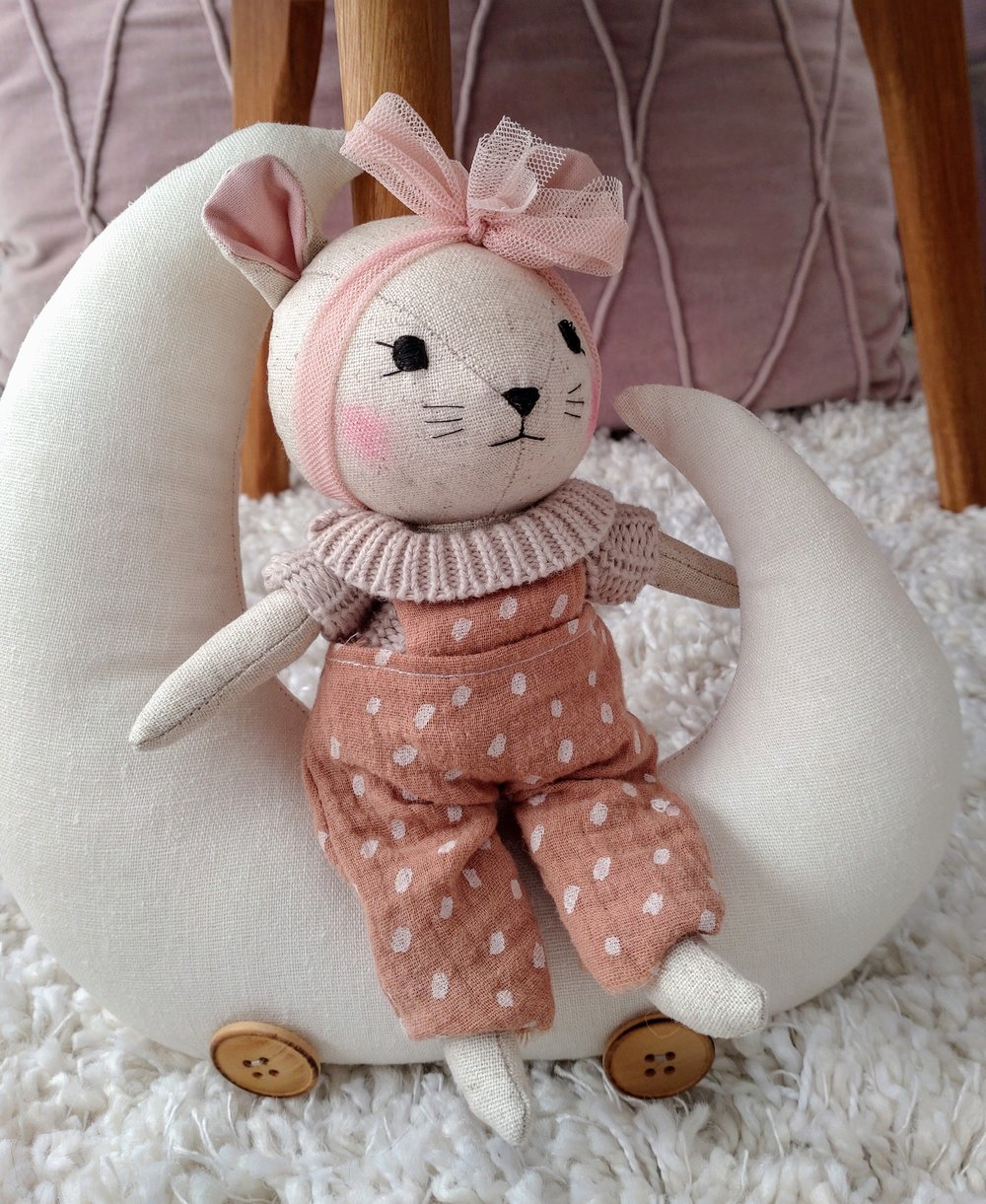 Image of Little mouse on moon bed. 