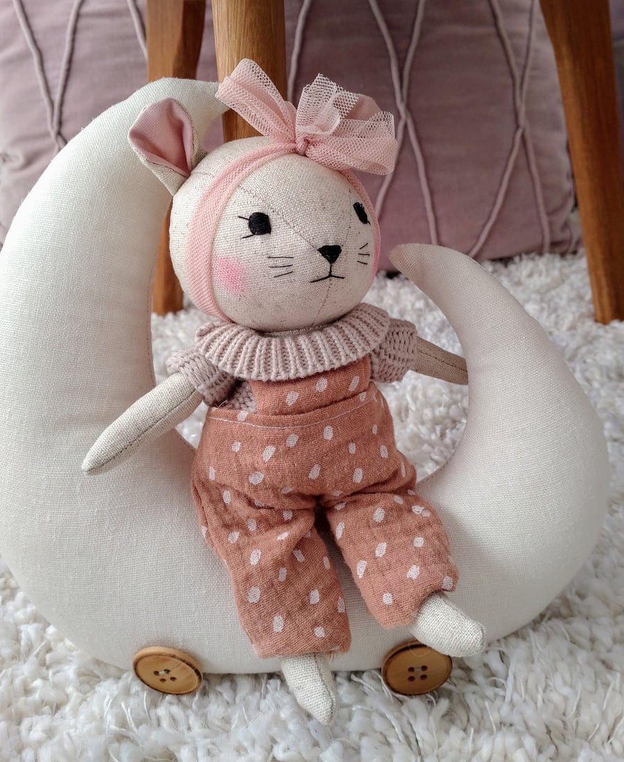 Image of Little mouse on moon bed. 