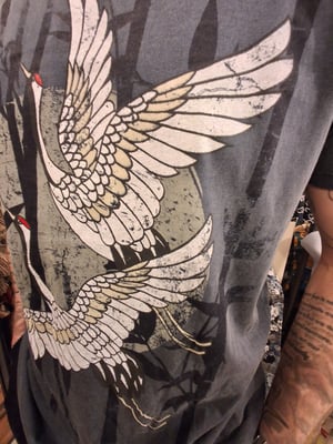 Image of cranes and moon 