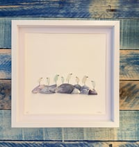 Seaglass birds on mussel shells 