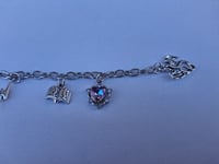 Image 1 of Violet Kindle Charm #2