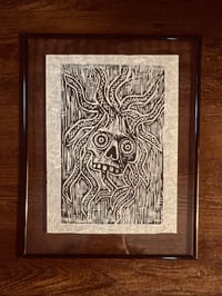 Shrunken gorgon skull