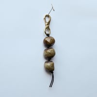 Image 1 of Dark brown speckle bag charm