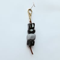 Image 1 of Black & blue bag charm
