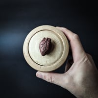 Image 1 of Your Heart Is A Muscle locking lid box