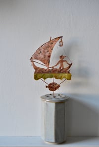 Image 3 of Boy in a sailboat