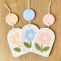 Image 1 of suspension "mini canard dans la fleur"