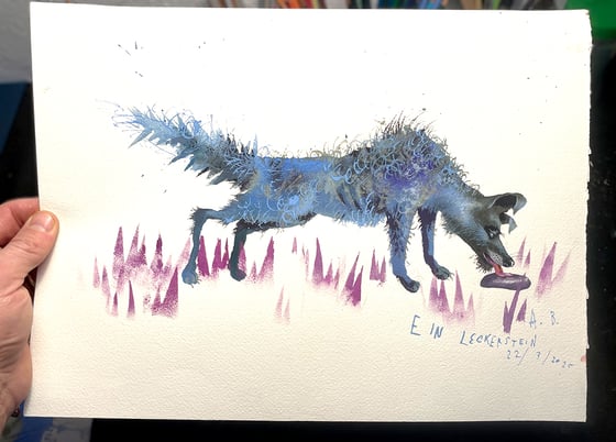 Image of Hund mit Stein