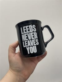Image 2 of Leeds Never Leaves You Black Mug