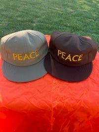 Image 1 of Peace Word Hat Duck