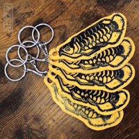 Image 1 of Arowana -  Lino Printed Wooden Keychains