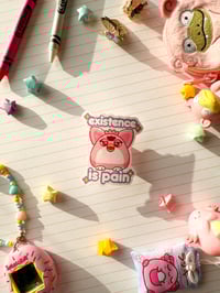 Image 2 of Ultra Glossy Glitter Furby Existence is Pain Vinyl Sticker