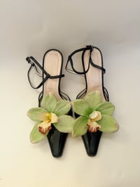 Image 1 of sample orchid shoe clips