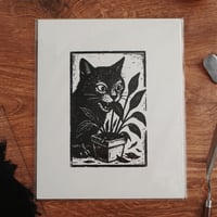 Image 1 of Plant-Eating Cat Linocut Print | 8x10 Black Cat Wall Art | Funny Cat Lover Gift | Whimsical Anima...