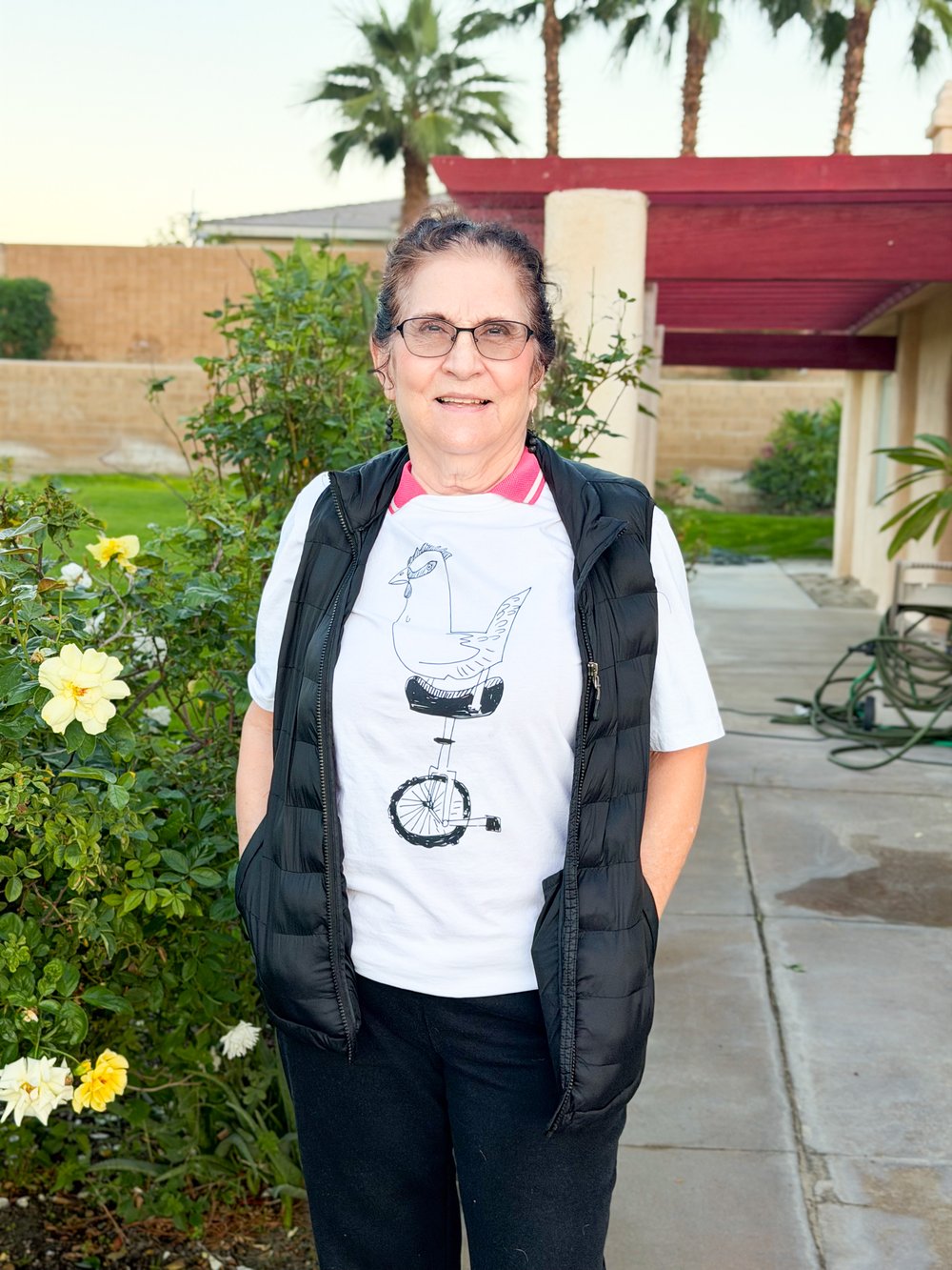 CHICKEN WITH A UNICYCLE - Unisex organic cotton t-shirt