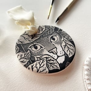 Image of Purrfectly Hidden, hand-painted ceramic bisque ornament