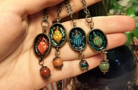 Image 1 of Weevil necklaces