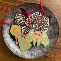 Image 2 of cryptid cookie ornaments 