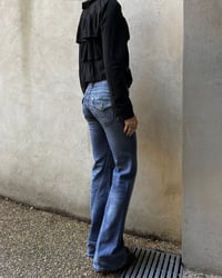 Image 1 of TWISTED BOOTCUT JEANS