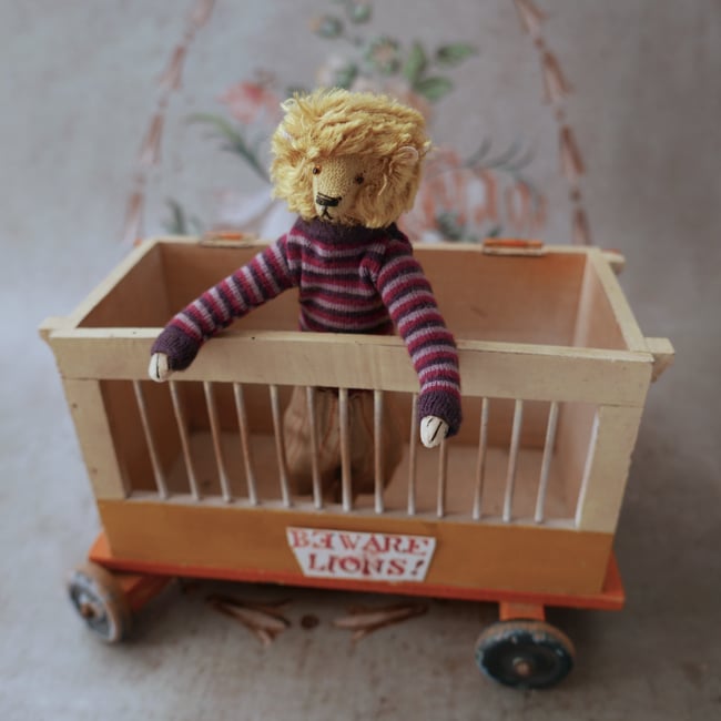 Lionel, a casually dressed lion 