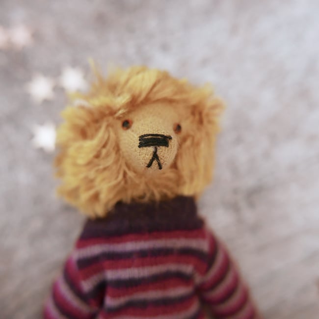 Lionel, a casually dressed lion 